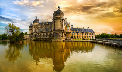 Poster - Great beautiful castles and heritage of France- Chateau de Chantilly over sunset