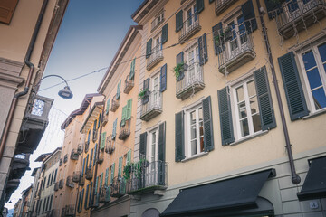 Wall Mural - Traditional italian architecture - house with windows' shutters