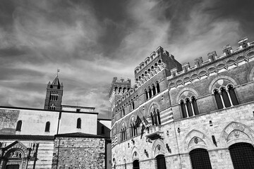 Wall Mural - Belfry of historic cathedral and Towers of a renaissance castle in the city of Grosseto