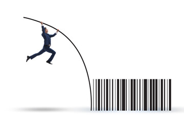 Businessman jumping over bar code in pole vaulting