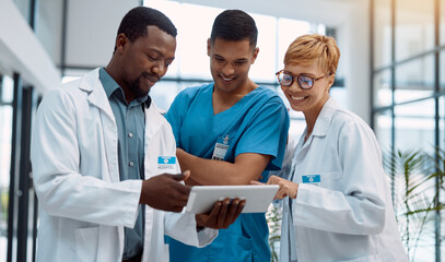 Wall Mural - Doctor, team and tablet in healthcare planning for research, idea or meeting on technology at hospital. Happy group of doctors with touchscreen for medical data, collaboration or teamwork strategy