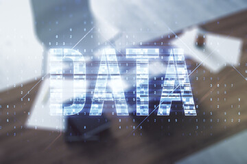 Wall Mural - creative data word sign and modern desktop with computer on background. multiexposure