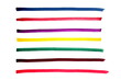 ©  DENIS   - Bright multi-colored stripes are drawn with a marker on a white background.