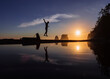 © Cavan Images - Slackliner walking over coastal water, La Push, Washington, USA