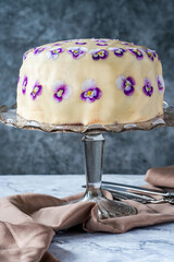 Sticker - Rainbow cake covered with marzipan and decorated with edible viola flowers