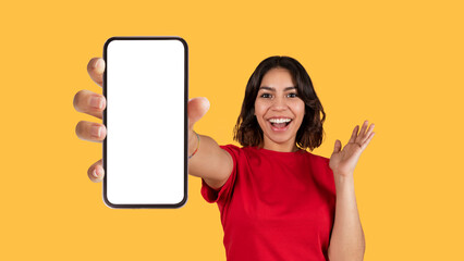 Emotional arab woman showing cell phone with empty screen