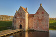 © Виктор Осипенко - Majestic castle surrounded by a moat in Denmark at sunset