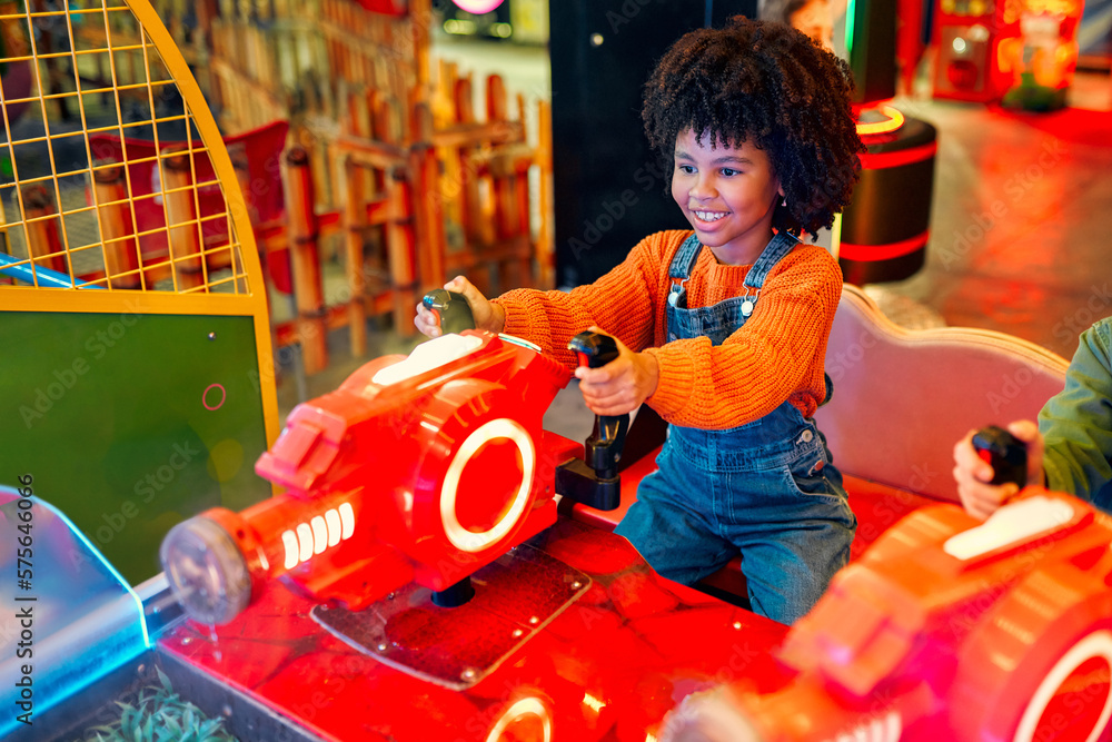 Little Kid Rides Kids having fun on a carnival Carousel Stock Photo | Adobe Stock