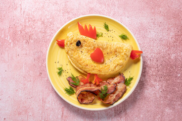 Wall Mural - Funny chick egg omelette with bacon vegetables for kids breakfast for Easter