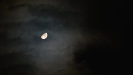 Wall Mural - Night sky with Moon and fast moving clouds. Shot through a telephoto lens