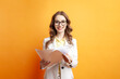 © Богдан Маліцький - business woman in white suit holds papers, girl manager in glasses with documents, college student