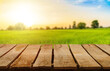 © TE - Wooden table top on blur rice field and mountain background.For place food,drink or health care business.fresh landscape and relax season concept.View of copy space.