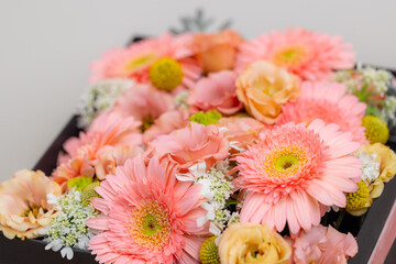 Canvas Print - Stack of different flower in a box