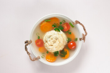 Wall Mural - Sop Matahari or Sop Manten is a Traditonal Soup from Solo, Indonesiaesia made from Chicken Minced and Egg.