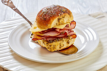 Poster - Hawaiian Ham and Swiss Slider on white plate