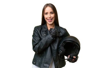 Wall Mural - Young pretty caucasian woman with a motorcycle helmet over isolated background celebrating a victory