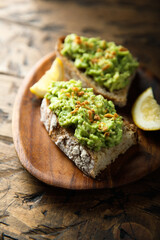 Wall Mural - Healthy toast with mashed avocado