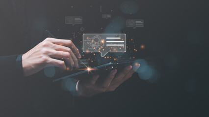 Businessman working on a tablet ,artificial intelligence ,Communication and interaction with technology ,Big data collection to process results ,Chatbot Chat with AI ,ChatGPT ,robot application