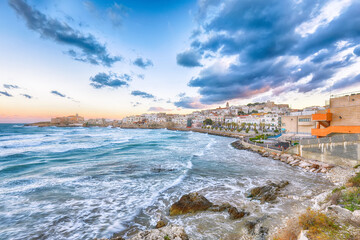 Wall Mural - Breathtaking view of historic center and promenade of the city of Vieste at sunset