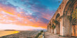 Terracina, Italy. Remains Of Temple Of Jupiter Anxur During Sunset. Amazing Sunset Or Sunrise Sky With Saturated Colorful Clouds