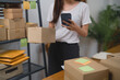 © mojo_cp - Start up small business owner preparing package delivery box Shipping for shopping online