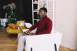 © BullRun - Surprised man using laptop while working