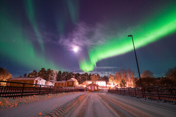 northern lights over a small town. nykarleby/uusikaarlepyy, finland