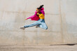 © VISTA by Westend61 - Young dancer hip hop dancing in front of wall