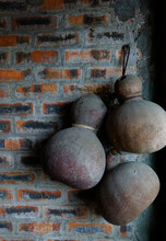 Dried Calabash Hanging On The Brick Wall As Decoration