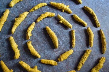 Wall Mural - Raw whole dried Turmeric root