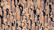 Classic city skyscrapers in isometric view in sepia tones with grainy vintage texture print effect