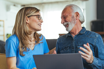 Wall Mural - Senior man, laptop and caregiver or home nurse helping patient with social media, communication and internet browsing at home. Support, healthcare and medical aid or hospice with pensioner