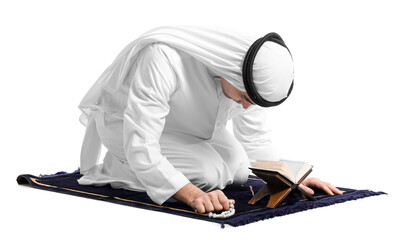 Wall Mural - Praying Muslim man with Koran on white background