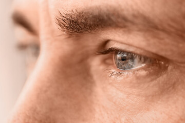 Wall Mural - mature man with blue eyes, closeup