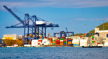 Cranes And Containers In Port