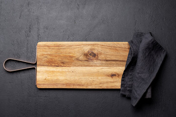 Wall Mural - Wooden cutting board and kitchen towel