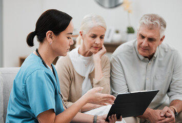 Canvas Print - Senior couple, doctor and retirement plan chart questions for hospital and health help paperwork. Asian woman, conversation and consulting survey in a wellness clinic with data and policy report