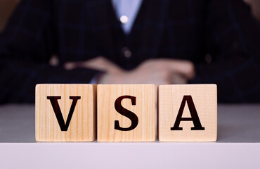 Wall Mural - The word VSA written on wood cube.