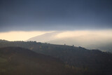 Fototapeta Kwiaty - storm cloud over the mountains
