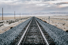 Railroad Tracks Crossing Barren Desert, Salt Lake City, Utah, USA