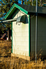 Industrial shed for storing wires and tubes for pumping and construction materials in work site on mountain