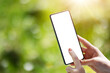 © candy1812 - Closeup view of the woman's hands holding smartphone.