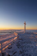 cross on the top of Tarnica in the Bieszczady Mountains on a frosty winter morning