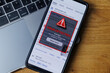 Virus warning notification on phone screen. Dangerous malware virus in phone Concept