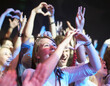 © Duncan M/peopleimages.com - We love you. Adoring fans enjoying a music concert.