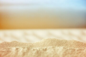 Poster - Desert sand grains blowing on a natural beach with text space. A picturesque outdoor scene, up close and personal, with a surface texture that is rough and wavy. Coastline destination for vacationers