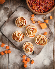 Wall Mural - Semi-finished rose shaped manti dumplings with beef and pumpkin