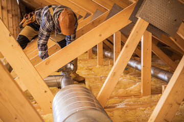 Wall Mural - HVAC Worker Installing Air Ducts