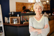 © Laflor/peopleimages.com - I invested in a small business after retirement. Portrait of a senior woman working in a coffee shop.