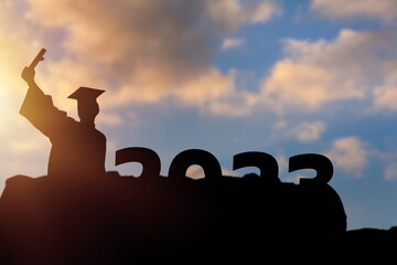 Silhouette of Graduation person and 2023 numbers